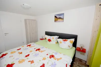 Ein Bett oder Betten in einem Zimmer der Unterkunft Grafenblick, Ferienwohnung mit Aussicht!