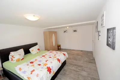 Ein Bett oder Betten in einem Zimmer der Unterkunft Grafenblick, Ferienwohnung mit Aussicht!