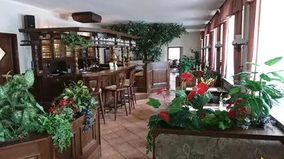Ein Restaurant oder anderes Speiselokal in der Unterkunft Pension Erbgericht