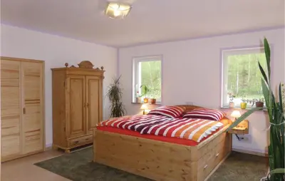Ein Bett oder Betten in einem Zimmer der Unterkunft Awesome Apartment In Freiberg With Wifi