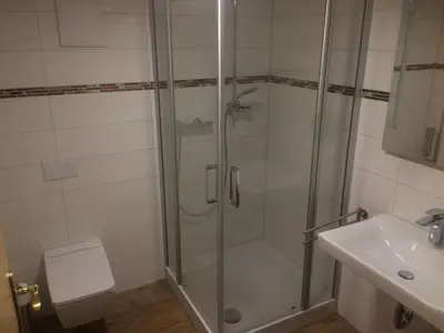 Ein Badezimmer in der Unterkunft Restaurant & Pension 