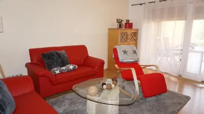 Ein Sitzbereich in der Unterkunft Ferienwohnung Albrecht Strandkorb