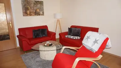 Ein Sitzbereich in der Unterkunft Ferienwohnung Albrecht Strandkorb