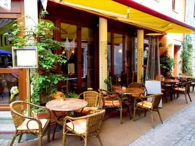 Ein Restaurant oder anderes Speiselokal in der Unterkunft Ferienwohnung Albrecht Strandkorb