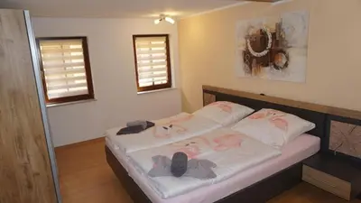 Ein Bett oder Betten in einem Zimmer der Unterkunft Ferienwohnung Albrecht Strandkorb