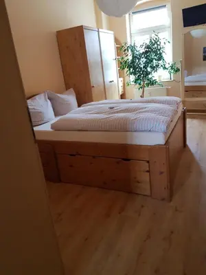 Ein Bett oder Betten in einem Zimmer der Unterkunft Kleine gemütliche Ferienwohnung
