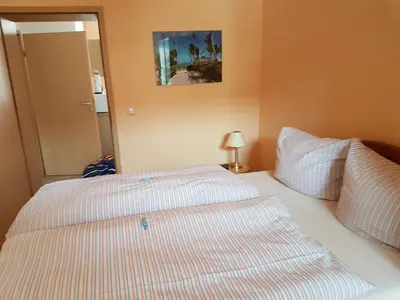 Ein Bett oder Betten in einem Zimmer der Unterkunft Kleine gemütliche Ferienwohnung