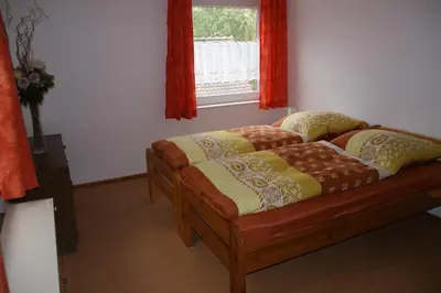 Ein Bett oder Betten in einem Zimmer der Unterkunft Tango ARA Cash