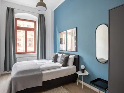 Ein Bett oder Betten in einem Zimmer der Unterkunft Limehome Dresden Hoyerswerdaerstraße