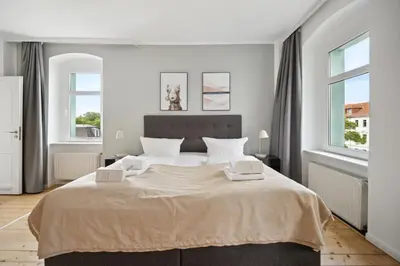Ein Bett oder Betten in einem Zimmer der Unterkunft Limehome Dresden Tannenstraße