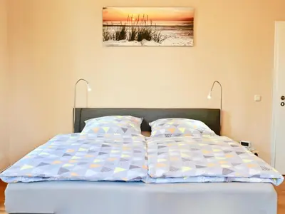 Ein Bett oder Betten in einem Zimmer der Unterkunft Residenz am Dresdner Stadtwald