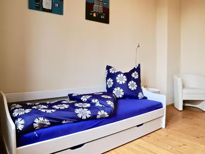 Ein Bett oder Betten in einem Zimmer der Unterkunft Residenz am Dresdner Stadtwald