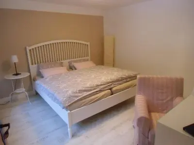 Ein Bett oder Betten in einem Zimmer der Unterkunft Ferienwohnung Simone