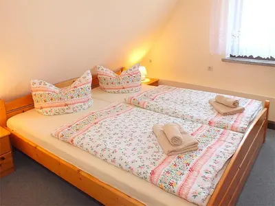 Ein Bett oder Betten in einem Zimmer der Unterkunft FH Schmidt