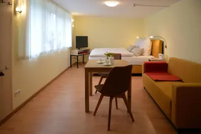 Ein Bett oder Betten in einem Zimmer der Unterkunft Ferienquartier Goethe33