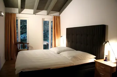 Ein Bett oder Betten in einem Zimmer der Unterkunft Ferienhaus Sonate - Kamin - Terrasse - Parkplatz