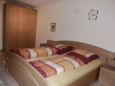 Ein Bett oder Betten in einem Zimmer der Unterkunft Zum Elleblick