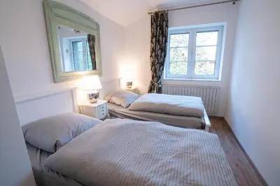 Ein Bett oder Betten in einem Zimmer der Unterkunft Villa Golding - Flat 2