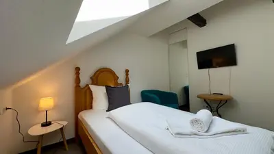 Ein Bett oder Betten in einem Zimmer der Unterkunft Das Sigl's