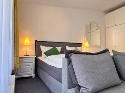 Ein Bett oder Betten in einem Zimmer der Unterkunft Das Sigl's
