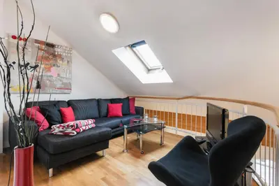 Ein Sitzbereich in der Unterkunft Comeback Apartment Central