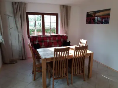 Ein Sitzbereich in der Unterkunft Ferienwohnung Wolf