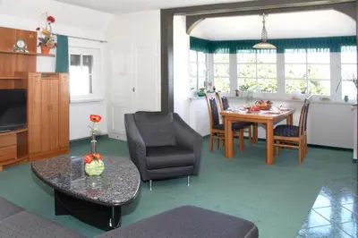 Ein Sitzbereich in der Unterkunft Villa Marie Ferienwohnungen