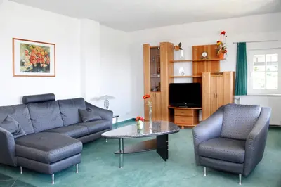 Ein Sitzbereich in der Unterkunft Villa Marie Ferienwohnungen