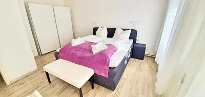 Ein Bett oder Betten in einem Zimmer der Unterkunft Ferienwohnung 