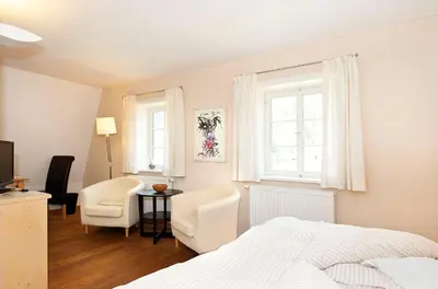 Ein Bett oder Betten in einem Zimmer der Unterkunft Fährmannhaus