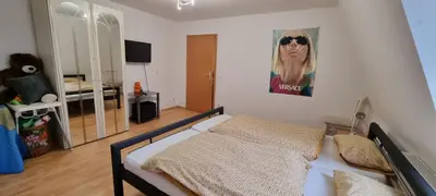 Ein Bett oder Betten in einem Zimmer der Unterkunft Apartment Karin