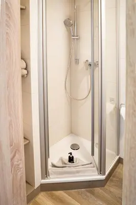 Ein Badezimmer in der Unterkunft Pension Hotel Sartor