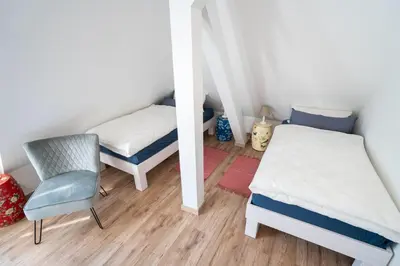 Ein Bett oder Betten in einem Zimmer der Unterkunft Villa Golding - Flat 3