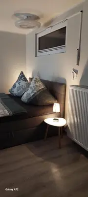Ein Bett oder Betten in einem Zimmer der Unterkunft Ferienwohnung oder Studio Dresden-Neustadt inkl Parkplatz mit Balkon oder Terrasse