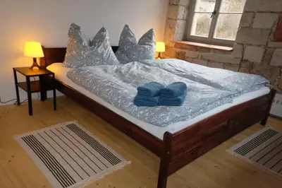Ein Bett oder Betten in einem Zimmer der Unterkunft 