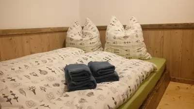 Ein Bett oder Betten in einem Zimmer der Unterkunft 