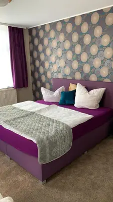 Ein Bett oder Betten in einem Zimmer der Unterkunft Pension Triebischtal