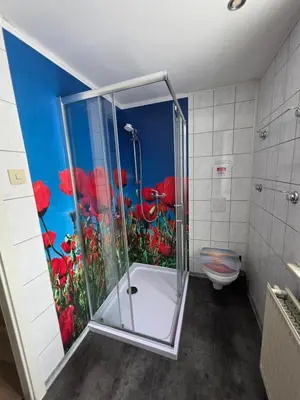 Ein Badezimmer in der Unterkunft Ferienwohnung an der Dresdner Heide - Langebrück
