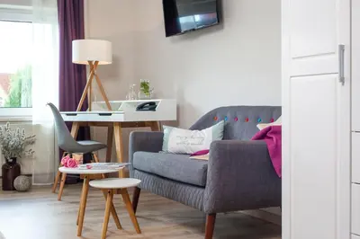 Ein Sitzbereich in der Unterkunft Landhotel Rosenschänke