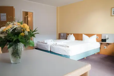 Ein Bett oder Betten in einem Zimmer der Unterkunft Aktiv-Hotel Stock & Stein