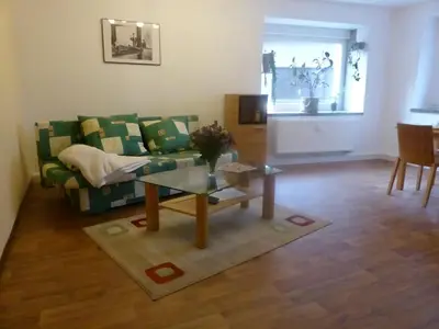 Ein Sitzbereich in der Unterkunft Ferienwohnung Zur Alten Eiche