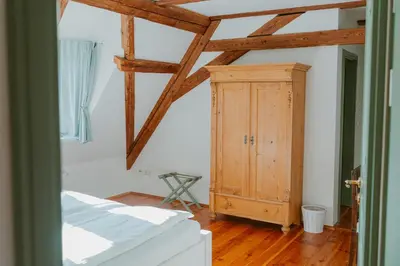 Ein Bett oder Betten in einem Zimmer der Unterkunft Rittergut Hirschbach