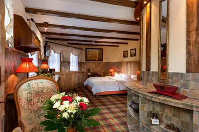 Ein Bett oder Betten in einem Zimmer der Unterkunft Wellnesshotel Seeschlößchen - Privat- Spa & Naturresort