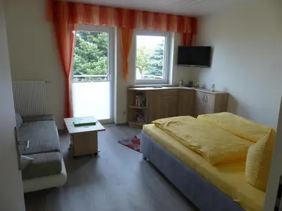 Ein Bett oder Betten in einem Zimmer der Unterkunft Apartment view of fortress in Pirna