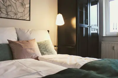 Ein Bett oder Betten in einem Zimmer der Unterkunft Apartment HENRY