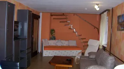 Ein Sitzbereich in der Unterkunft Ferienwohnung