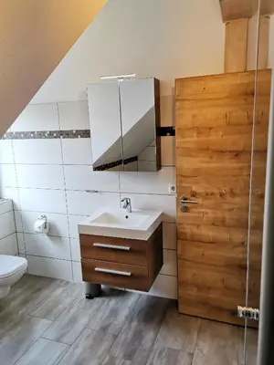Ein Badezimmer in der Unterkunft Apartment in Papstdorf 