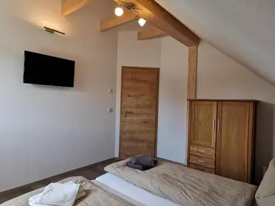 Ein Bett oder Betten in einem Zimmer der Unterkunft Apartment in Papstdorf 