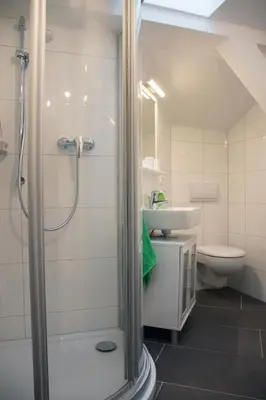 Ein Badezimmer in der Unterkunft Apartmenthaus Luise