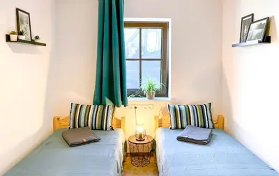 Ein Bett oder Betten in einem Zimmer der Unterkunft FeWoMaurer WG2 Erdgeschoss